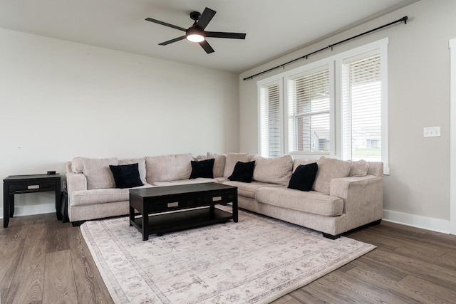650 Anacostia Dr, Roscoe, IL 61073 - living area with wood finished floors and ceiling fan