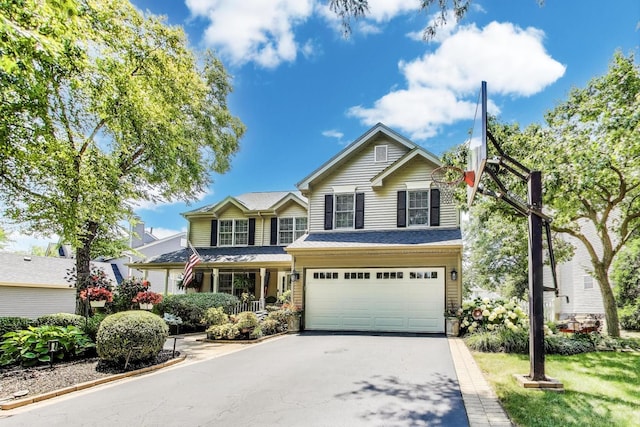 346 Colonial Cir, Geneva, IL 60134 - traditional-style home featuring asphalt driveway and a garage