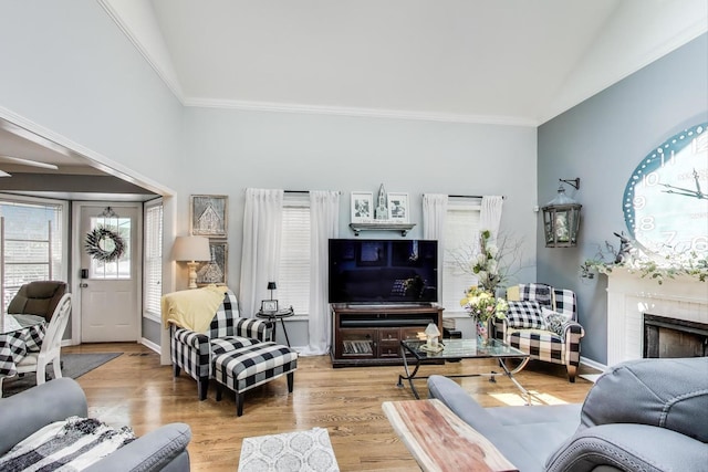 346 Colonial Cir, Geneva, IL 60134 - living room with crown molding, wood finished floors, a fireplace, and vaulted ceiling