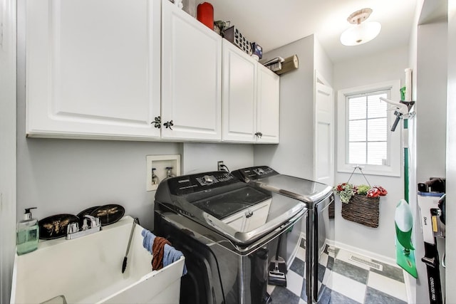 346 Colonial Cir, Geneva, IL 60134 - laundry room featuring separate washer and dryer and cabinet space