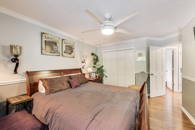 346 Colonial Cir, Geneva, IL 60134 - bedroom with a closet, light wood-type flooring, ornamental molding, and ceiling fan