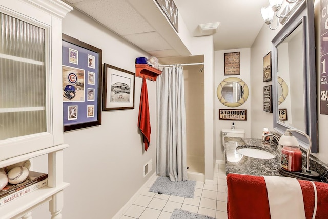 346 Colonial Cir, Geneva, IL 60134 - bathroom featuring tile patterned flooring, a shower stall, and vanity