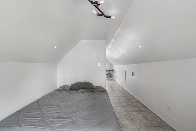 2630 S Spaulding Ave, Chicago, IL 60623 - bedroom featuring lofted ceiling and tile patterned flooring