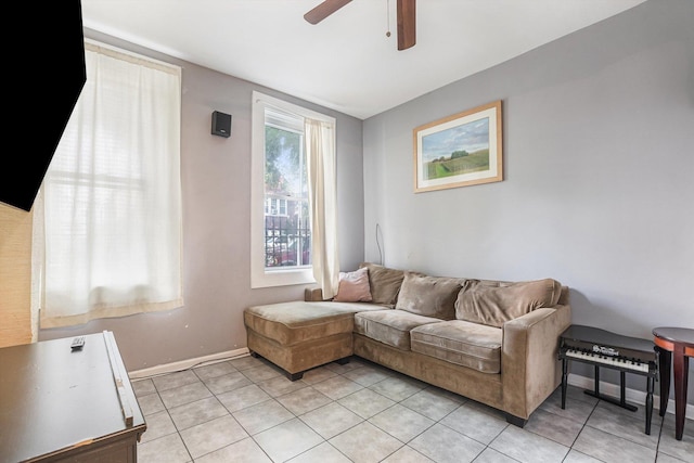 2630 S Spaulding Ave, Chicago, IL 60623 - living area featuring light tile patterned floors and a ceiling fan