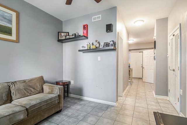 2630 S Spaulding Ave, Chicago, IL 60623 - living room featuring light tile patterned floors and ceiling fan