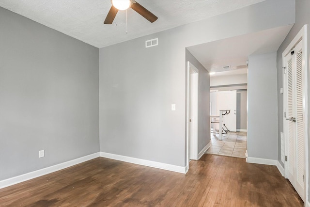 2630 S Spaulding Ave, Chicago, IL 60623 - unfurnished room featuring a ceiling fan and wood finished floors