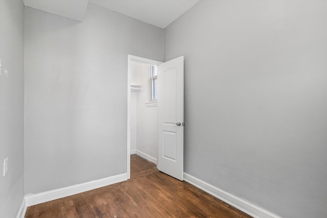 2630 S Spaulding Ave, Chicago, IL 60623 - spare room with baseboards and dark wood-type flooring