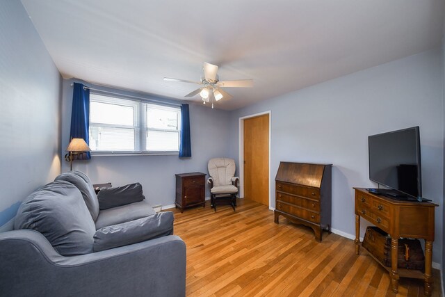 114 Kansas St, Geneva, IL 60134 - living room with ceiling fan and light wood-style flooring