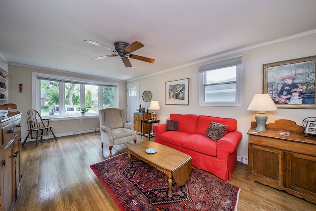 114 Kansas St, Geneva, IL 60134 - living room featuring wood-type flooring, a ceiling fan, crown molding, and a baseboard heating unit