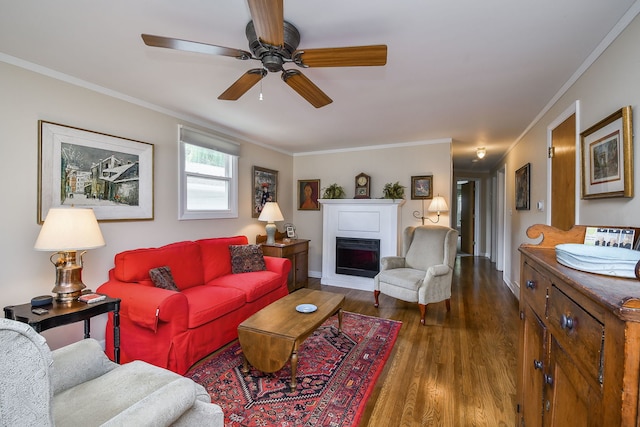 114 Kansas St, Geneva, IL 60134 - living room with wood finished floors, crown molding, a ceiling fan, and a fireplace