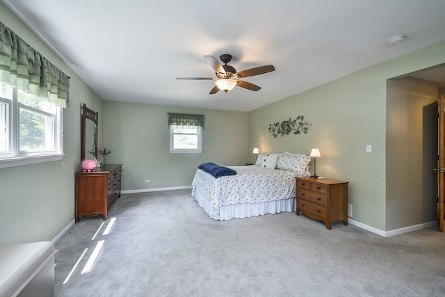 114 Kansas St, Geneva, IL 60134 - carpeted bedroom featuring baseboards and a ceiling fan