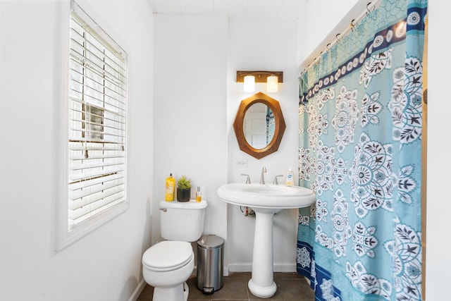 512 Ryerson Ave, Elgin, IL 60123 - bathroom with tile patterned flooring, plenty of natural light, and curtained shower