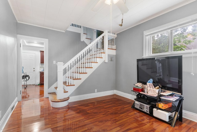 512 Ryerson Ave, Elgin, IL 60123 - staircase with ornamental molding, wood finished floors, and ceiling fan