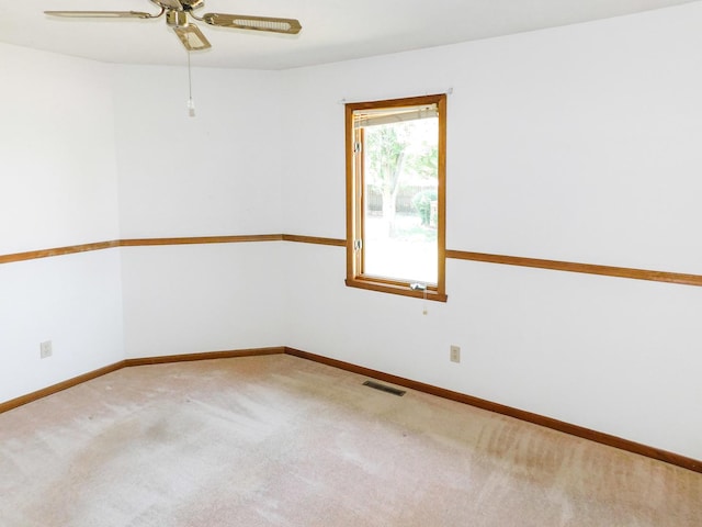 6059 Durrington Dr, Loves Park, IL 61111 - unfurnished room featuring a ceiling fan and carpet flooring