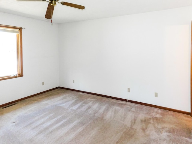 6059 Durrington Dr, Loves Park, IL 61111 - spare room with light carpet and a ceiling fan
