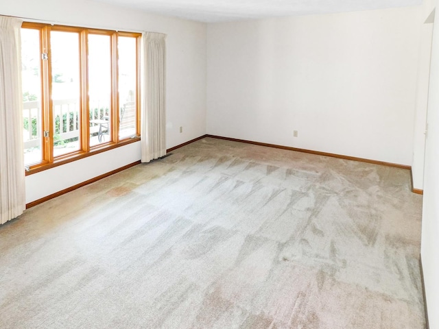 6059 Durrington Dr, Loves Park, IL 61111 - carpeted empty room featuring baseboards