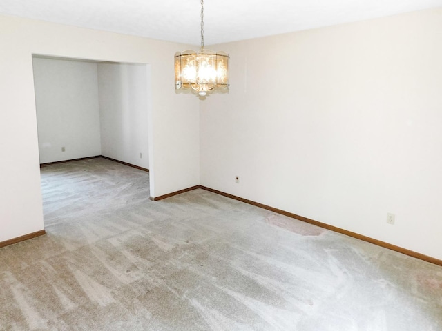 6059 Durrington Dr, Loves Park, IL 61111 - empty room with a chandelier and carpet floors