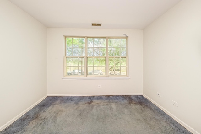 1465 N Larrabee St Unit B, Chicago, IL 60610 - empty room featuring baseboards and dark carpet