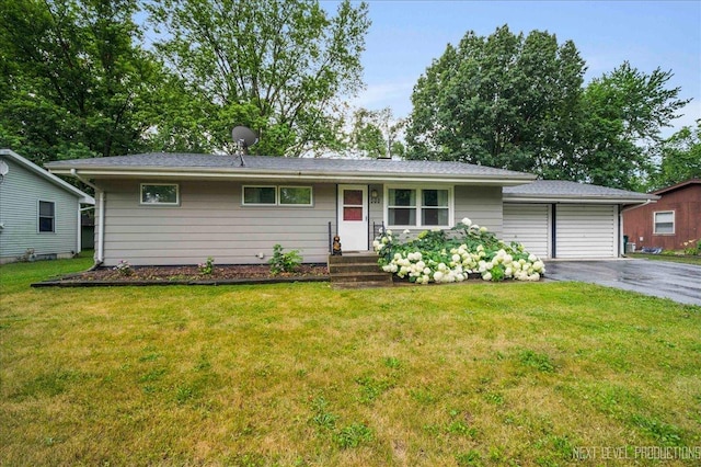 508 E Park St, Plano, IL 60545 - ranch-style home featuring a garage, driveway, and a front lawn