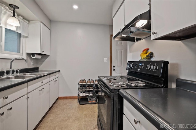 508 E Park St, Plano, IL 60545 - kitchen featuring black / electric stove, under cabinet range hood, white cabinetry, dark countertops, and recessed lighting