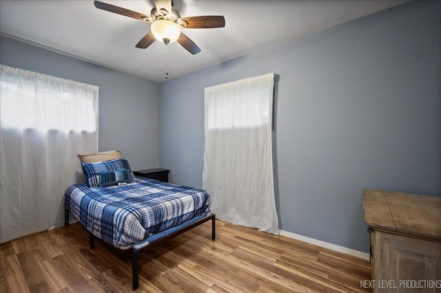 508 E Park St, Plano, IL 60545 - bedroom featuring wood finished floors and ceiling fan