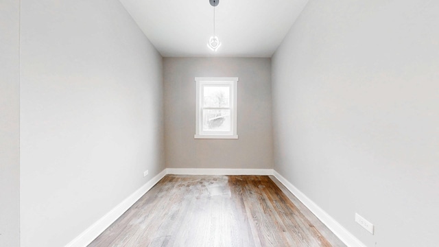 5915 S Sangamon St, Chicago, IL 60621 - empty room featuring wood finished floors and baseboards
