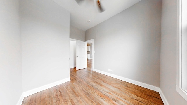 5915 S Sangamon St, Chicago, IL 60621 - empty room with ceiling fan, light wood-style flooring, and high vaulted ceiling