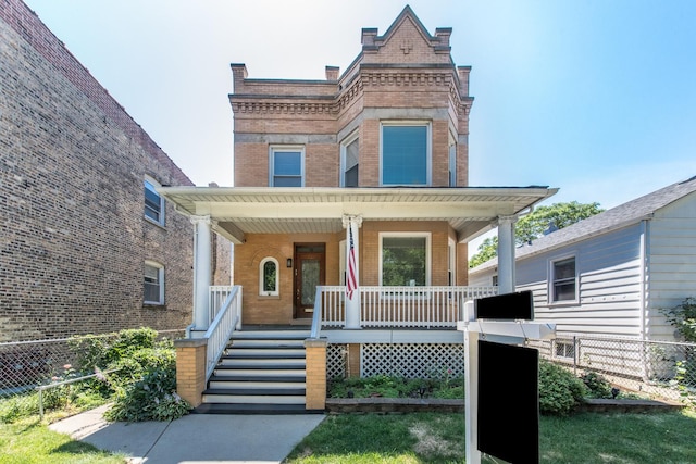 3029 N Haussen Ct, Chicago, IL 60618 - view of front of house with brick siding and covered porch