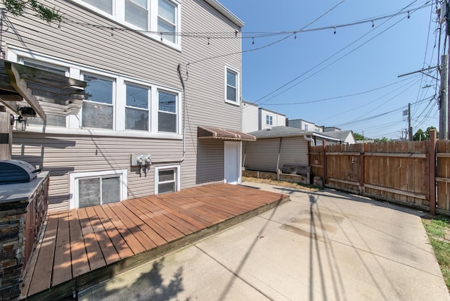 3029 N Haussen Ct, Chicago, IL 60618 - wooden deck featuring a patio area
