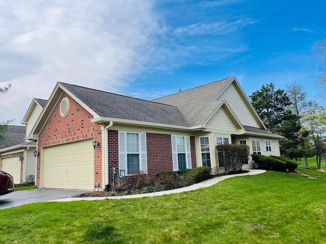 36138 N Springbrook Ln Unit 36138, Gurnee, IL 60031 - traditional home with roof with shingles, a front lawn, brick siding, driveway, and an attached garage