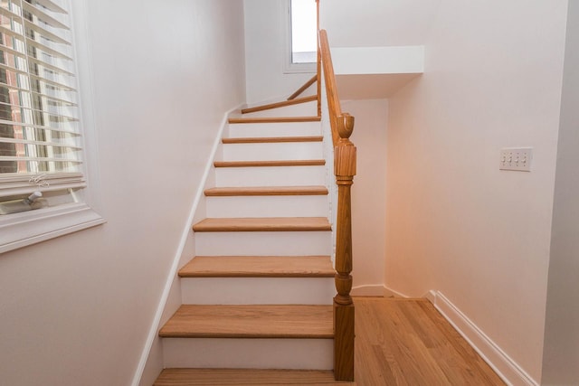 3056 N Paulina St, Chicago, IL 60657 - staircase featuring wood finished floors and baseboards