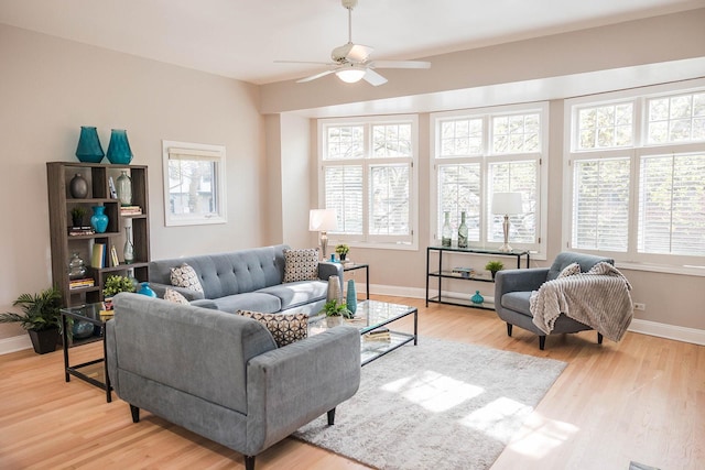 3056 N Paulina St, Chicago, IL 60657 - living area with ceiling fan and light wood-style flooring