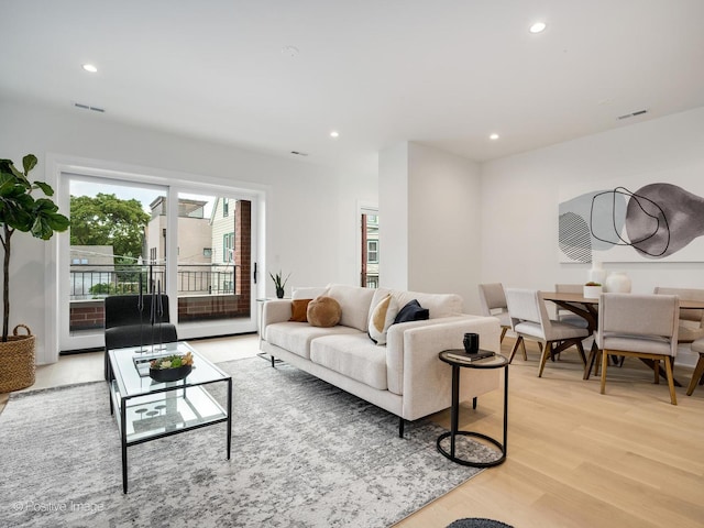 2841 N Southport Ave Unit 2, Chicago, IL 60657 - living area with light wood-style flooring and recessed lighting