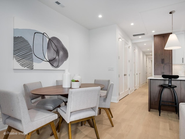 2841 N Southport Ave Unit 2, Chicago, IL 60657 - dining room with light wood finished floors and recessed lighting