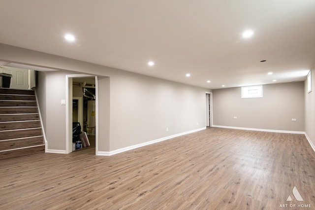 8226 Bob O Link Rd, Orland Park, IL 60462 - below grade area with recessed lighting, stairway, light wood-style floors, and water heater