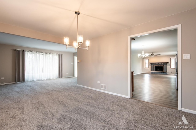 8226 Bob O Link Rd, Orland Park, IL 60462 - carpeted spare room with a chandelier and a fireplace