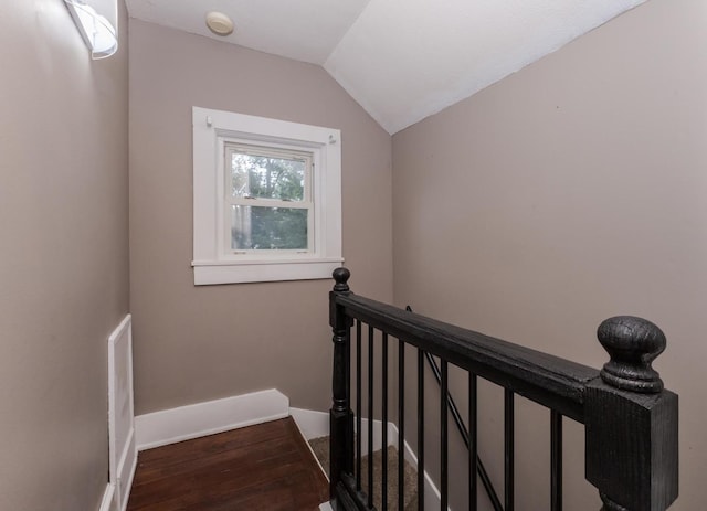 616 N Main St, Pontiac, IL 61764 - staircase featuring vaulted ceiling and wood finished floors