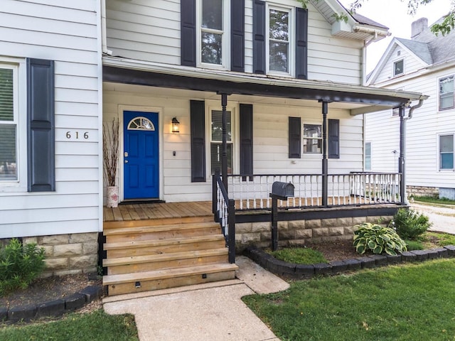 616 N Main St, Pontiac, IL 61764 - property entrance with a porch