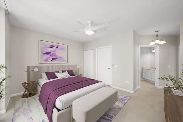125 S Jefferson St Unit 1702, Chicago, IL 60661 - bedroom with light colored carpet, ensuite bathroom, ceiling fan, and a chandelier