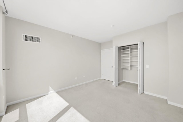 125 S Jefferson St Unit 1702, Chicago, IL 60661 - unfurnished bedroom featuring light carpet and a closet