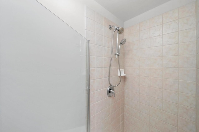 125 S Jefferson St Unit 1702, Chicago, IL 60661 - full bathroom featuring a tile shower