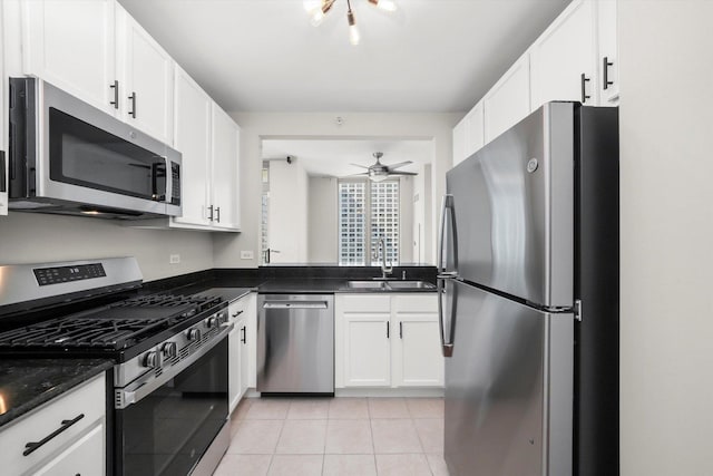 125 S Jefferson St Unit 1702, Chicago, IL 60661 - kitchen with appliances with stainless steel finishes, ceiling fan, light tile patterned flooring, and white cabinetry