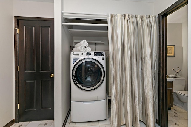 1622 Pickwick Ln, Dekalb, IL 60115 - laundry room with washer / clothes dryer and baseboards