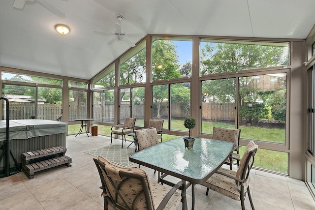 1622 Pickwick Ln, Dekalb, IL 60115 - sunroom with a hot tub, outdoor dining space, vaulted ceiling, ceiling fan, and plenty of natural light