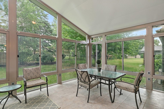 1622 Pickwick Ln, Dekalb, IL 60115 - sunroom / solarium featuring vaulted ceiling and outdoor dining area
