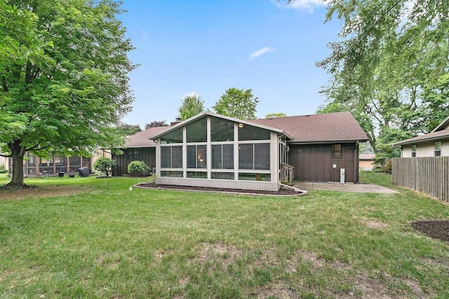 1622 Pickwick Ln, Dekalb, IL 60115 - back of house with a sunroom