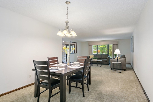 1622 Pickwick Ln, Dekalb, IL 60115 - dining room featuring light colored carpet, a chandelier, and a textured ceiling