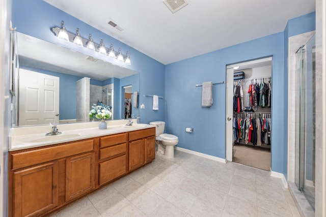 1905 Oxley Cir, Naperville, IL 60563 - bathroom featuring a spacious closet, a stall shower, double vanity, and tile patterned floors