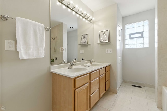 1708 W Chicago Ave Unit 3, Chicago, IL 60622 - full bathroom with double vanity, a shower, tile patterned floors, and a bathtub