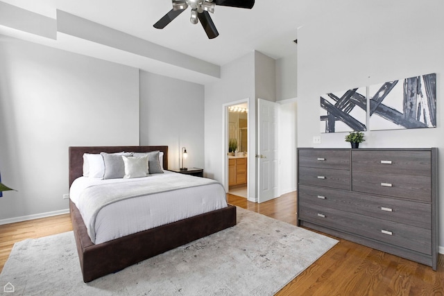 1708 W Chicago Ave Unit 3, Chicago, IL 60622 - bedroom with wood finished floors, ensuite bathroom, and ceiling fan